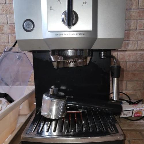 a coffee maker sitting on top of a stove at DIANA Seaside Holiday in Olimp