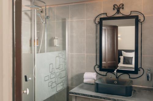 Ένα μπάνιο στο Auberge de la Treille - Chambres d'Hôtes