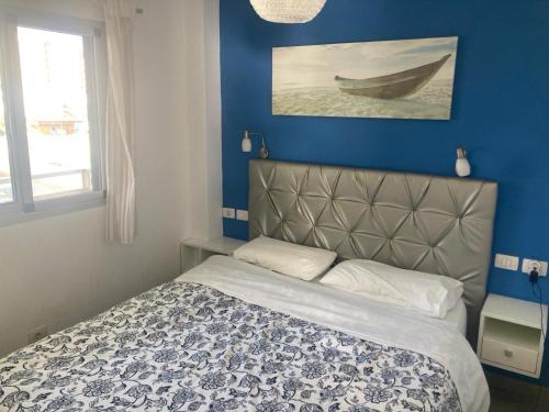Posteľ alebo postele v izbe v ubytovaní Apartamento Jumilla Vista Mar 35