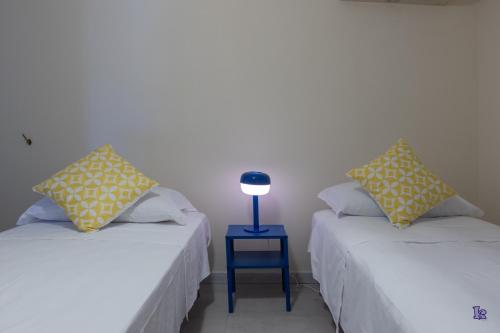 Ένα ή περισσότερα κρεβάτια σε δωμάτιο στο Villa Filbertina