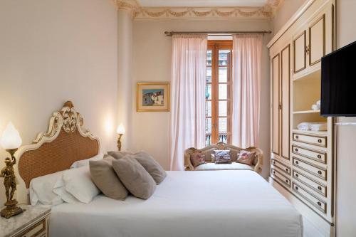 Llit o llits en una habitació de Cerrajería Luxury House