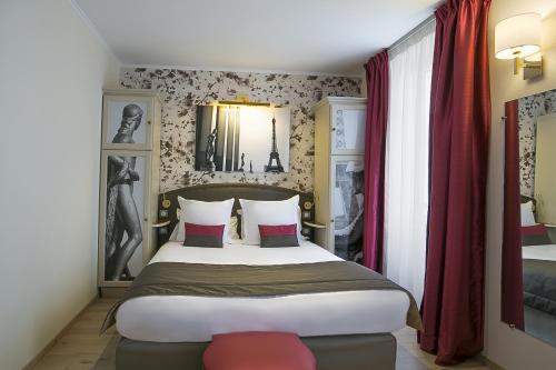 Cama ou camas em um quarto em Best Western Au Trocadéro