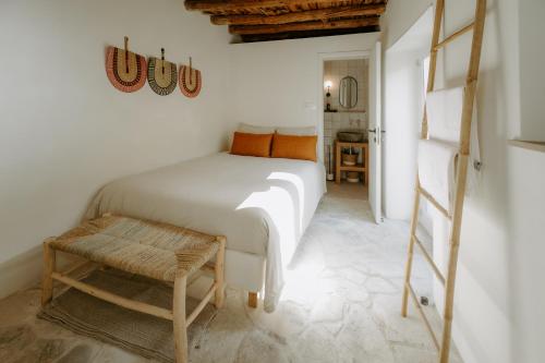 Postel nebo postele na pokoji v ubytování Smaragda's Guest Rooms