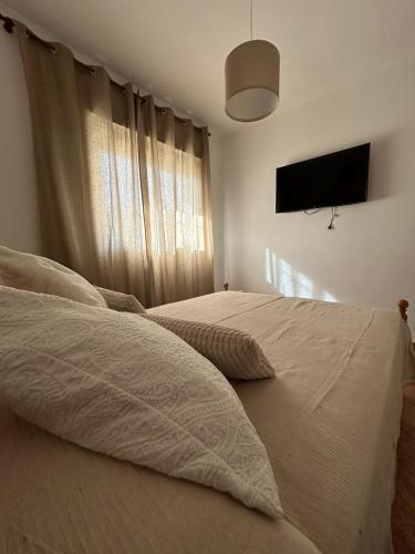 Ένα ή περισσότερα κρεβάτια σε δωμάτιο στο CASA ZOE