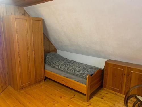 Un ou plusieurs lits dans un hébergement de l'établissement Ferienhaus Erinnerung