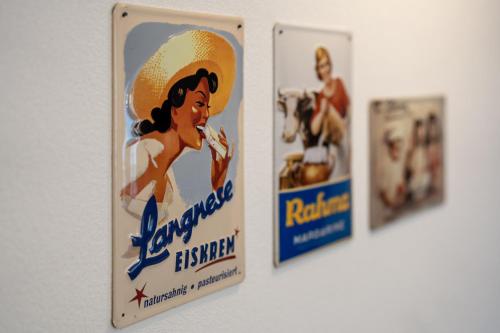 a group of posters on a wall at Ferienwohnung Schätzle in Schuttertal