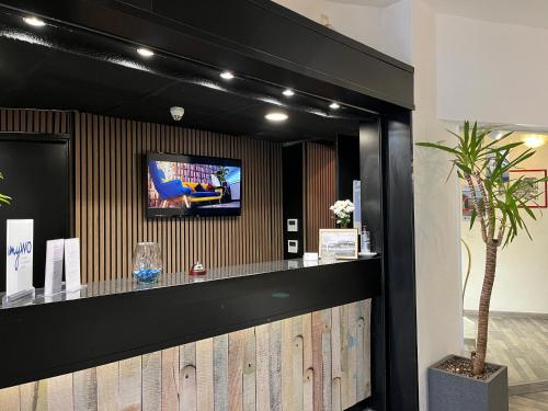 TV a/nebo společenská místnost v ubytování Best Western Hotel & Spa Austria-La Terrasse