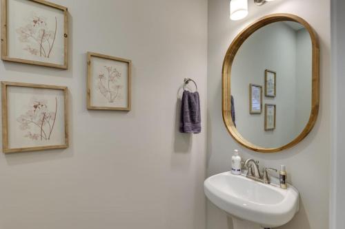 a bathroom with a sink and a mirror at Beautiful cottage next to Tims Ford Lake in Tullahoma
