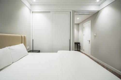 Ένα ή περισσότερα κρεβάτια σε δωμάτιο στο Luxury Apartment Altara