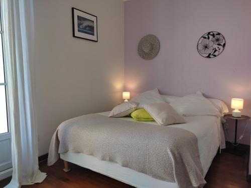 Katil atau katil-katil dalam bilik di B&B Amphitryon
