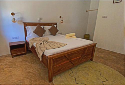 Postel nebo postele na pokoji v ubytování Coco Beach Hotel