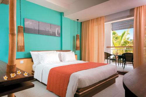 Un ou plusieurs lits dans un hébergement de l'établissement Laguna Beach Hotel & Spa