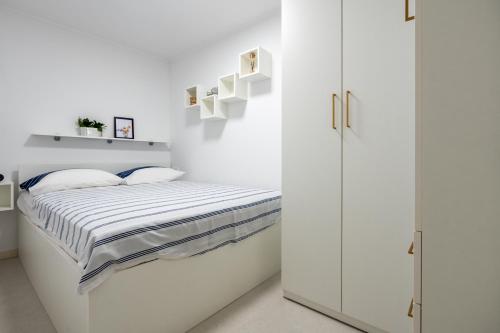 Postel nebo postele na pokoji v ubytování Studio Apartman Tonka