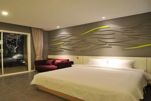 Ένα ή περισσότερα κρεβάτια σε δωμάτιο στο Paeva Luxury Serviced Residence SHA