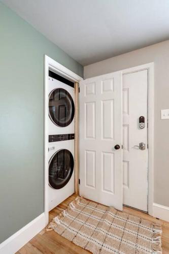 a laundry room with a washer and dryer at Renovated 2 BR home close to Lancaster attractions in Lancaster