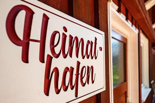 Certifikát, hodnocení, plakát nebo jiný dokument vystavený v ubytování Heimathafen