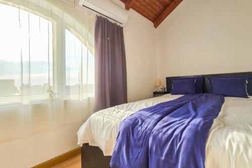 Posteľ alebo postele v izbe v ubytovaní Ocean Apartment