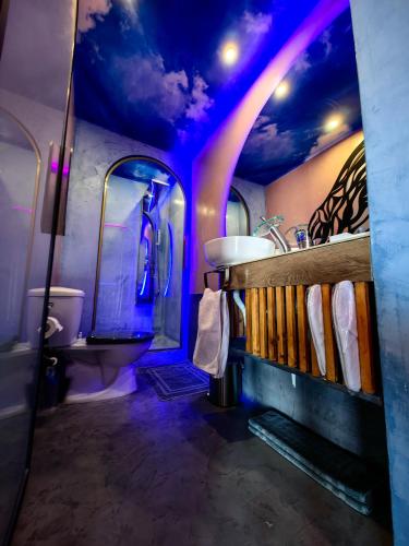 a bathroom with a sink and a toilet at Nina Apartment in Chania Town