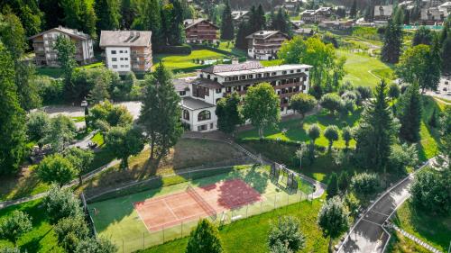 an aerial view of a campus with a building at Villars Lodge in Villars-sur-Ollon