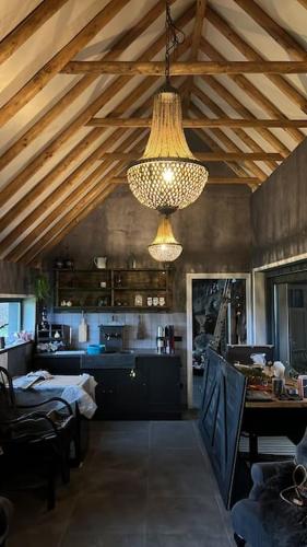 Postel nebo postele na pokoji v ubytování B&B de Witte Weide