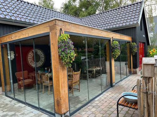 Patio nebo venkovní prostory v ubytování B&B de Witte Weide