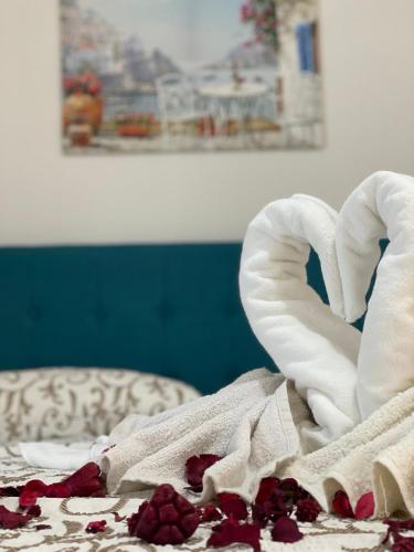 Ein Bett oder Betten in einem Zimmer der Unterkunft Apartments Pericic LUX