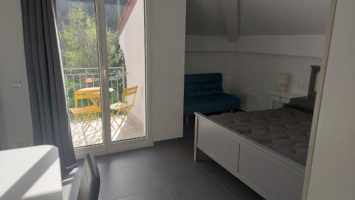 Ένα ή περισσότερα κρεβάτια σε δωμάτιο στο B&B La casa al mare di MatiGiò "Camera G"