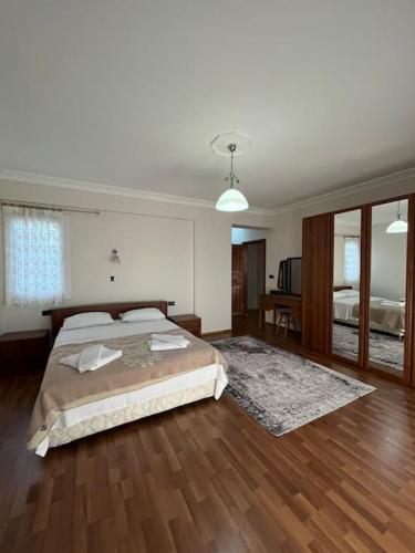 Postel nebo postele na pokoji v ubytování Villa Deniz