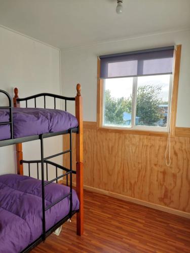 Llit o llits en una habitació de Cabañas Nelly