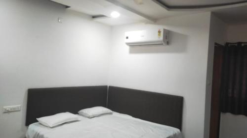 Ένα ή περισσότερα κρεβάτια σε δωμάτιο στο Hotel LION'S BNB