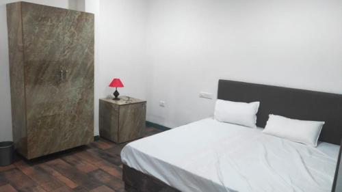 Ένα ή περισσότερα κρεβάτια σε δωμάτιο στο Hotel LION'S BNB