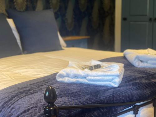 Llit o llits en una habitació de Durham City Cottages