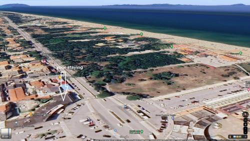 an aerial view of a city next to the ocean at Attico Vista Mare in Tirrenia