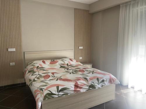 Ένα ή περισσότερα κρεβάτια σε δωμάτιο στο Hotel Nais Beach