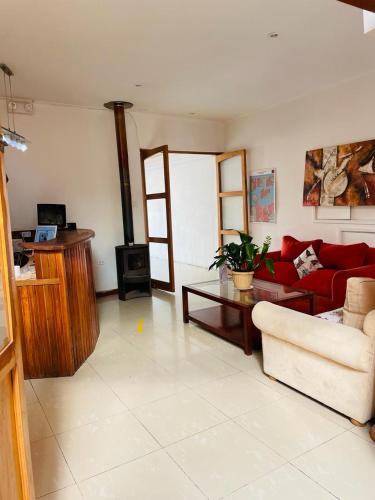Una televisión o centro de entretenimiento en Hotel Palermo Quintero