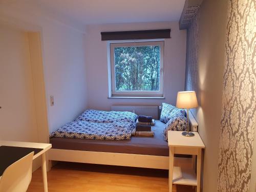 Cama ou camas em um quarto em Einfache Gästewohnung 'nordlicht'