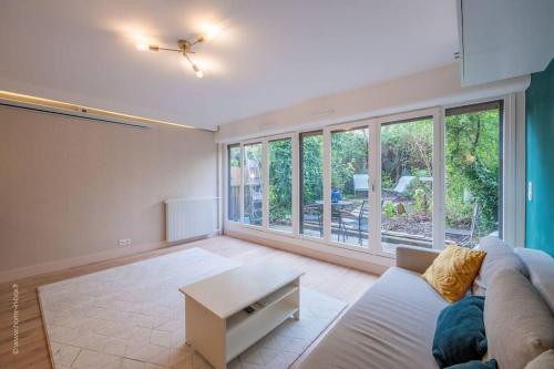 Appartement design avec jardin privatif
