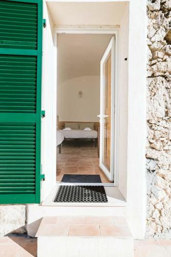 Letto o letti in una camera di Agriturismo Il Canto delle rane