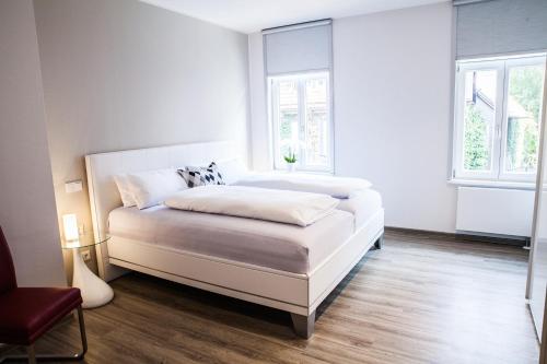 Giường trong phòng chung tại Altstadt Appartements Goslar