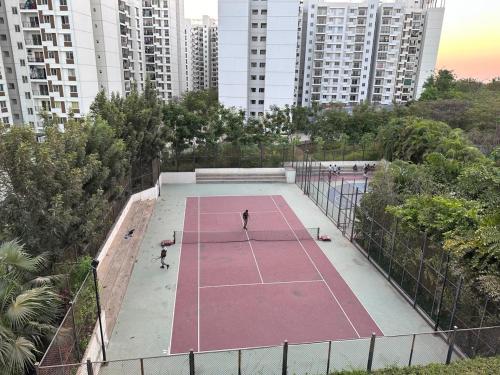 Tenis dan/atau kemudahan skuasy di Tranquil Haven Retreat - near Bangalore International Exhibition Centre atau berdekatan