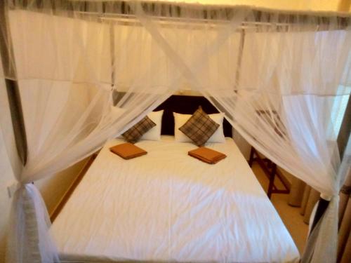 Ένα ή περισσότερα κρεβάτια σε δωμάτιο στο Brave Villa