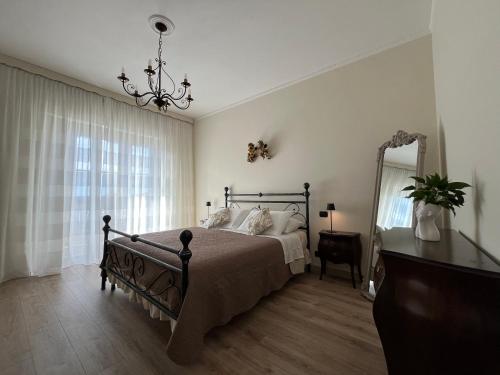 Postel nebo postele na pokoji v ubytování VITTORE 11 SQUARE