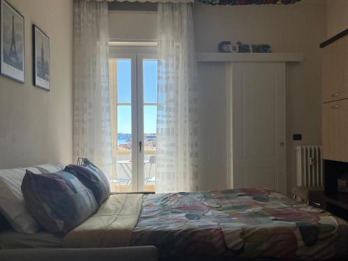 Postel nebo postele na pokoji v ubytování VITTORE 11 SQUARE