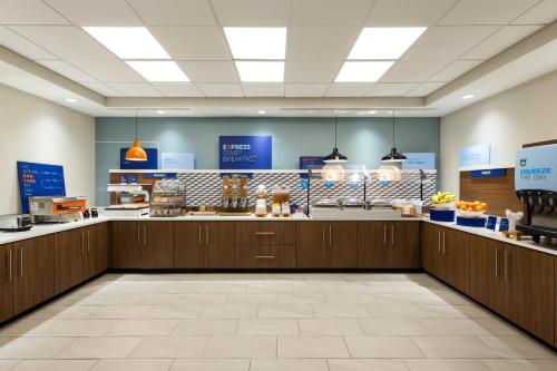 a view of the food counter of a store at Holiday Inn Express Savannah Airport by IHG in Savannah