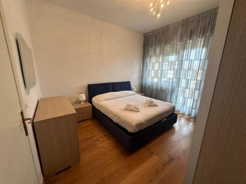 Una cama o camas en una habitación de Appartamento Imperia • Firenze