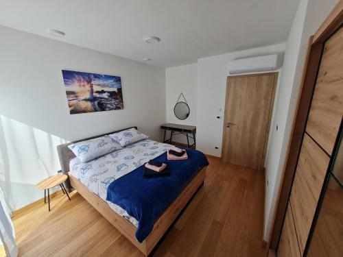 Postel nebo postele na pokoji v ubytování APP MARE Umag