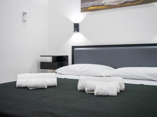 Katil atau katil-katil dalam bilik di Aliva room LT