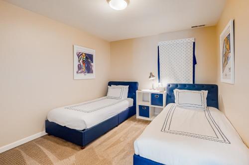 Ένα ή περισσότερα κρεβάτια σε δωμάτιο στο Riverside Vista Retreat