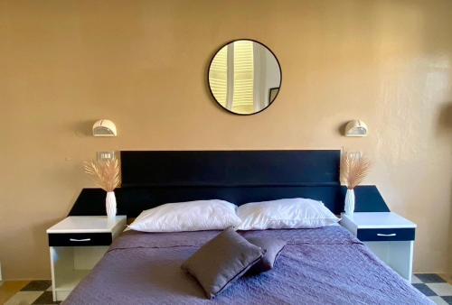 Postel nebo postele na pokoji v ubytování Hotel Villa Pozzi