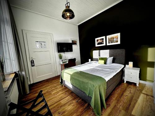 Privathotel Riesenbeckにあるベッド